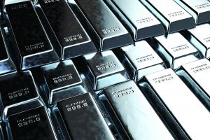 A stack of solid platinum ingots on an isolated dark background - 3D render
