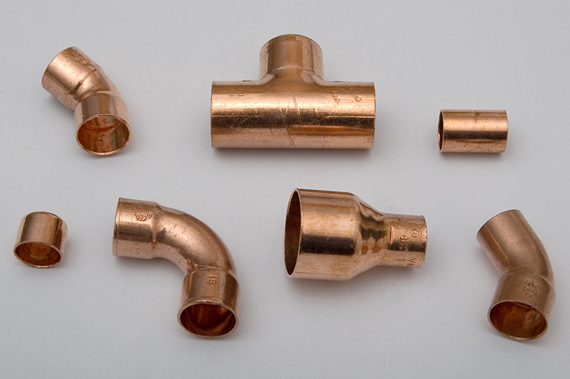 Shiny metallic copper pipe fittings